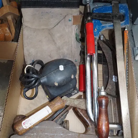 box; builder's belt, hand plane, F clamps etc