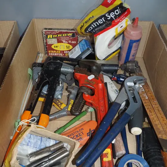 box; plumbers stilsons, string line, pop riveter