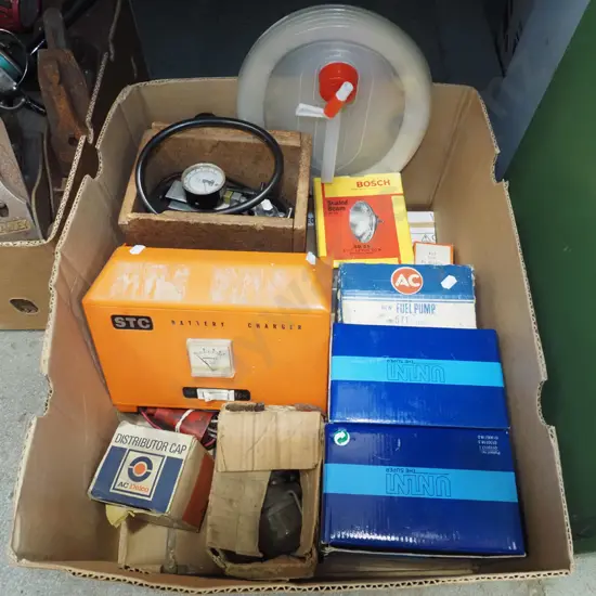 box; battery charger, 12V air compressor, light fittings, rotary display stands etc