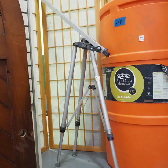 tripod stand - possibly for portable satellite dish