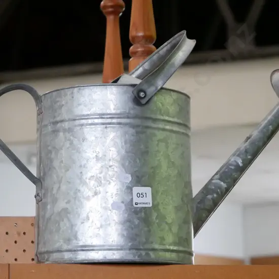 galvanised watering can