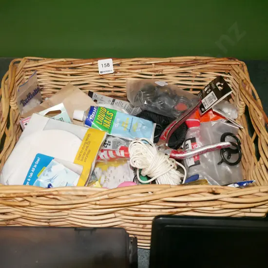 cane basket; wall plugs, CDs, rope, glue etc