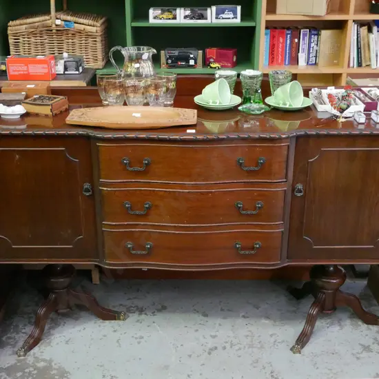 mahogany twin pedestal based buffet sideboard with 2 doors, 3 drawers, 1 with cutlery interior