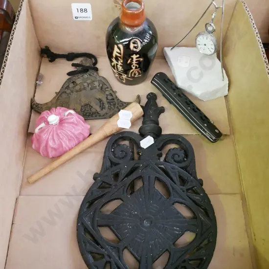 box; cast iron trivet, figurines, pocket knife etc