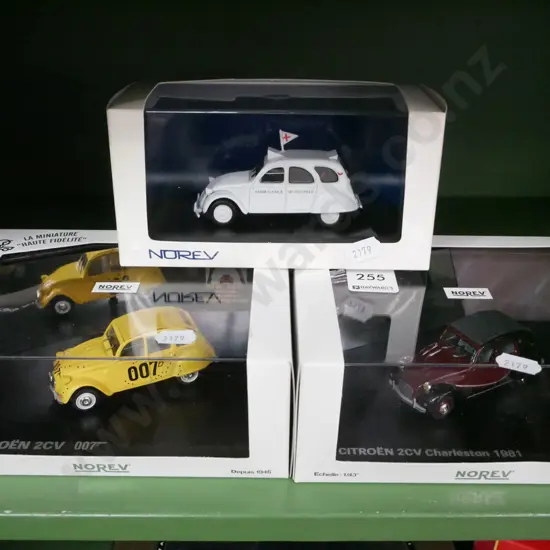 3x boxed model vehicles