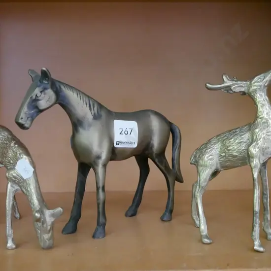 brass deer and horse figurine