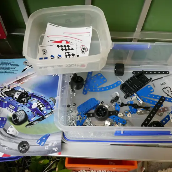 Mecanno model racing car in container