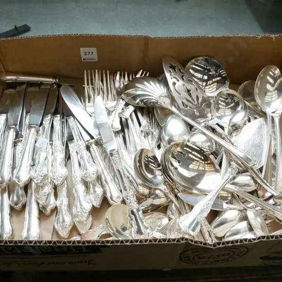 box of plated cutlery