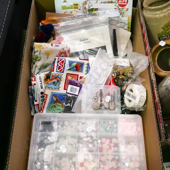 box; crafter's supplies; stick on beads, buttons etc