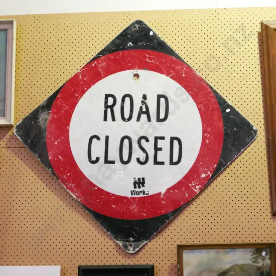 retired Road Closed sign