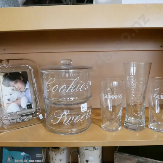 shelf; crystal photo frame, lidded canisters, beer glasses