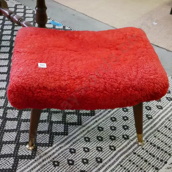 retro footstool with red sheepskin upholstery