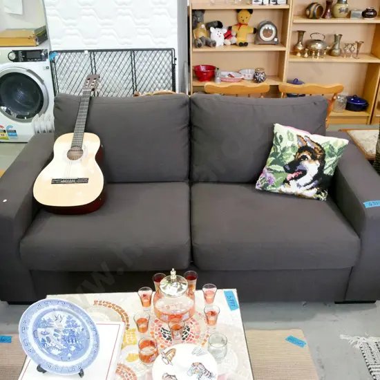 charcoal upholstered 2 settee divan bed - very tidy