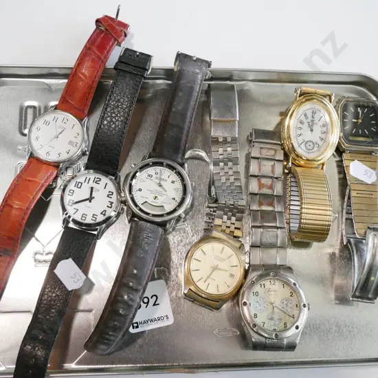 tin tray of various wristwatchess