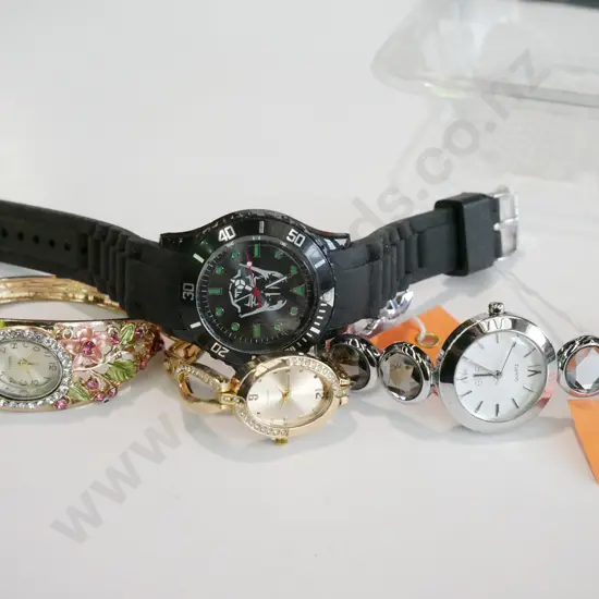 tray of wristwatches