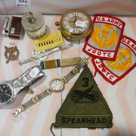 box; US military badges, travellers alarm clock etc