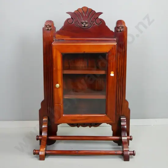 reproduction mahogany wall-mount cupboard with bevelled edge glazed door, 2 hanging rails, carved detailing H-860 W-620