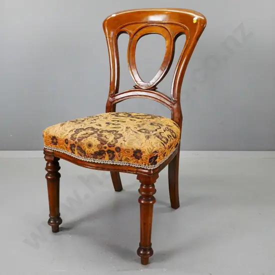 Victorian oak side chair with oval cutout back splat, turned front legs, floral upholstered seat,  fading to fabric