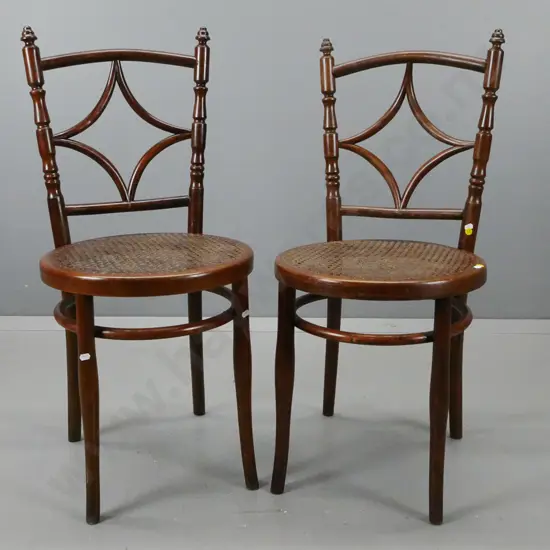 pair of Josef Hoffman bent wood side chairs with diamond design back, cane seat, maker's label under seat H900 W390 D420