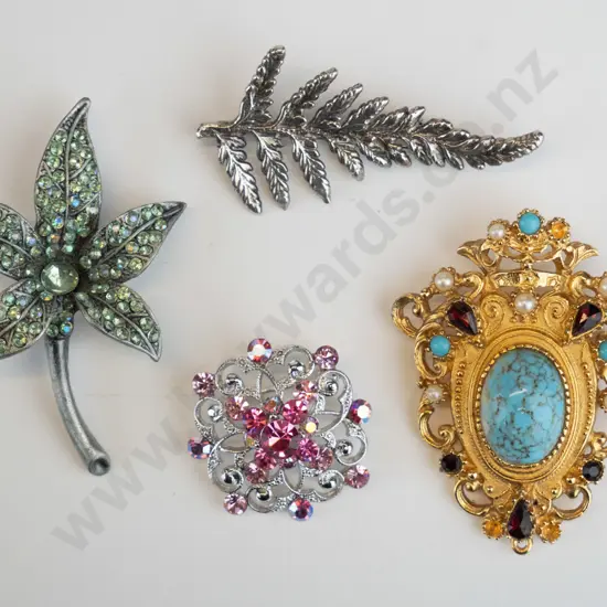4 costume brooches