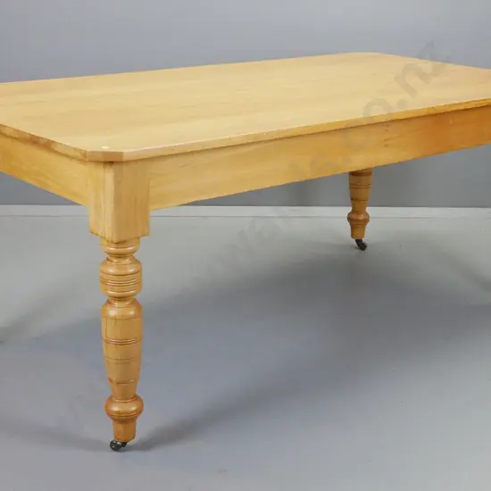 Edwardian rimu turned-leg table on porcelain casters - some light scratching and small splits to top H770 L1820 W990