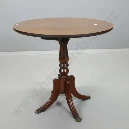 reproduction round drop side swivel top occasional table on column base, 4 sweeping legs & brass claw feet - some water
