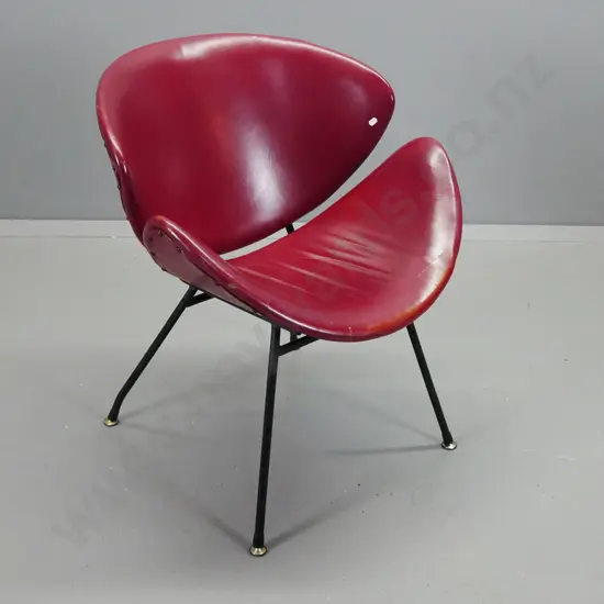 retro lip chair with black painted legs, maroon vinyl upholstery, some scratching / wear to seat H-770 W-660 D-610