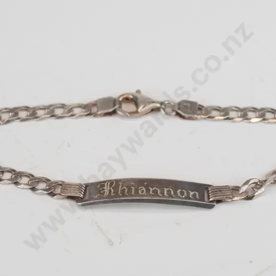 silver ID bracelet with the name "Rhiannon' stamped 925