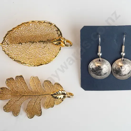 pair of earrings made from 3d & 2 costume brooches