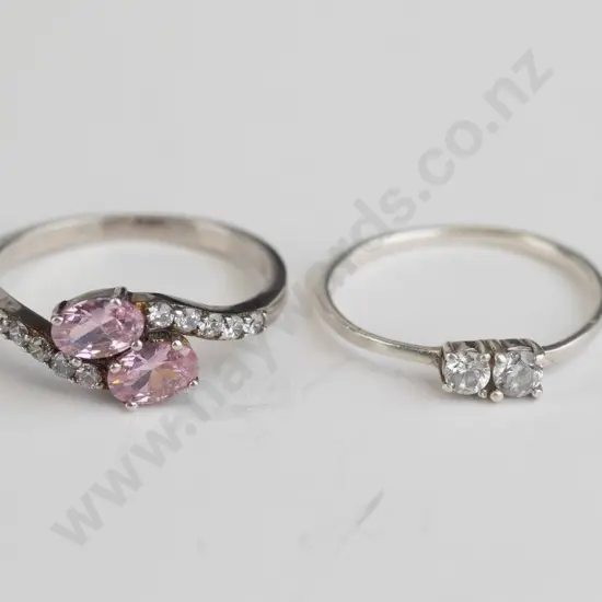 2 silver cz rings both stamped 925