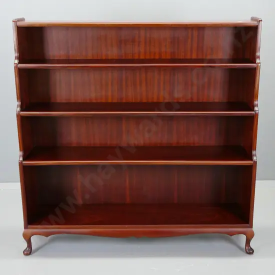 mahogany waterfall front bookcase w/ 5 fixed shelves, shaped skirt on small cab feet H-1250 W-1230 D-300 at base