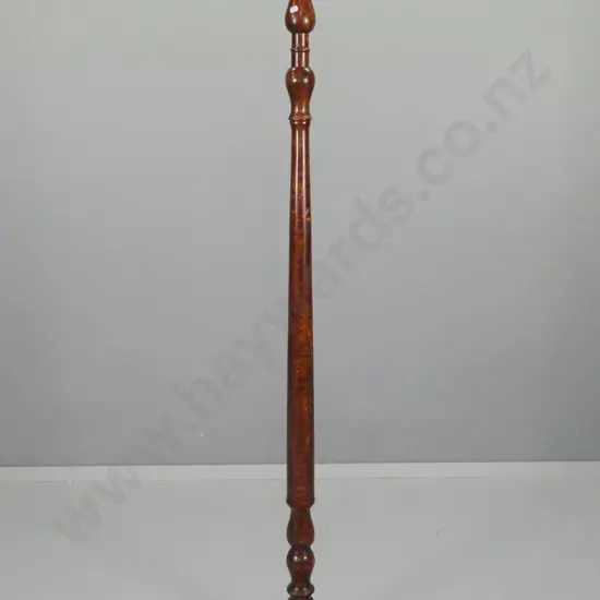 tall timber torchiere candle stand with faux wood grain finish, copper drip tray at top, on circular base, some candle