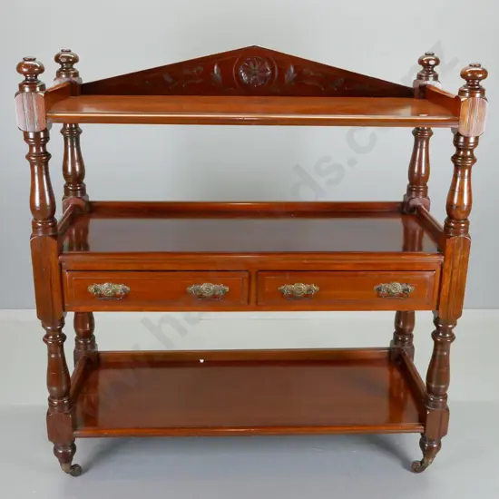 antique mahogany dumb waiter with 2 drawers, carved detail and turned columns, on porcelain & brass casters H1300 W1210