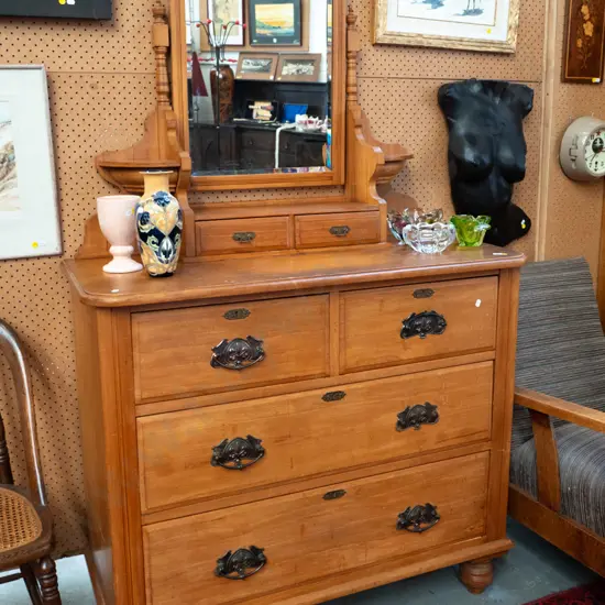 colonial rimu dresser with bevelled edge mirror, turned supports and candle stands above 2 small upper and 4 lower