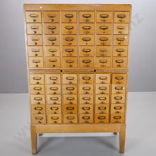 vintage large 60-drawer library file card cabinet with 3 writing slides in centre, paneled sides and back, on square