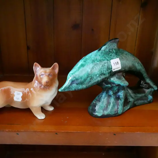 dog and dolphin figurine