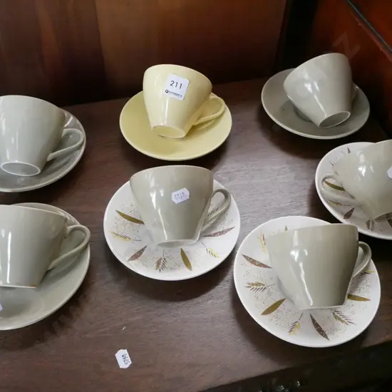 assorted Crown Lynn cups and saucers