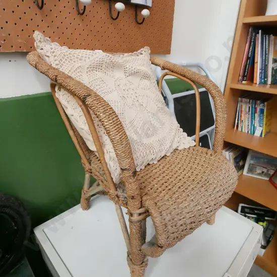 woven seagrass child's chair with cushion