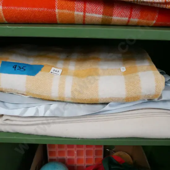 yellow checked and cream woollen blankets