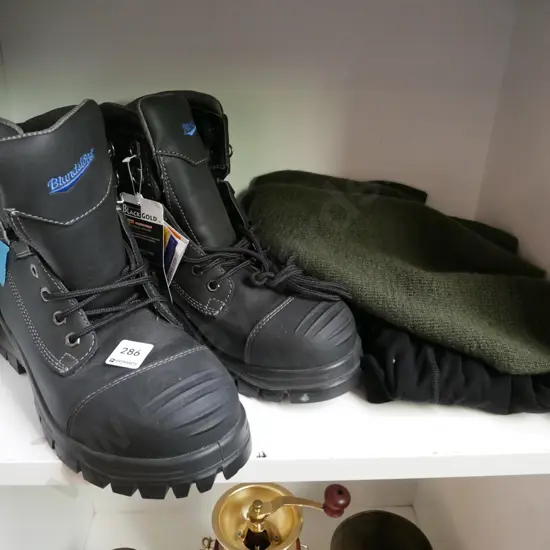 pair of Blundstone size 9 steel cap boots, kahki woollen scarf, black survival XL thermal top