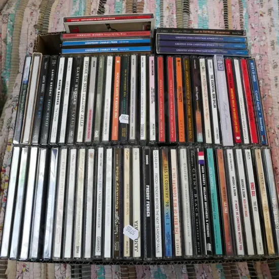 box of country, folk and other CDs