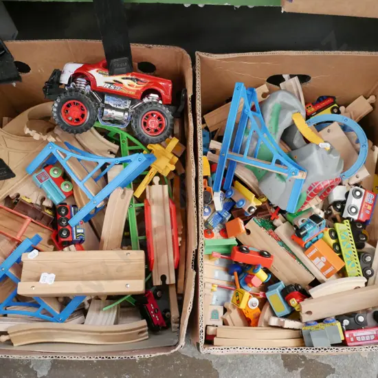 2 boxes; toy wooden train tracks, trains etc