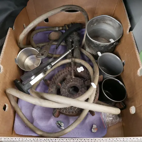 box; camping mugs, rusty gas cooker etc