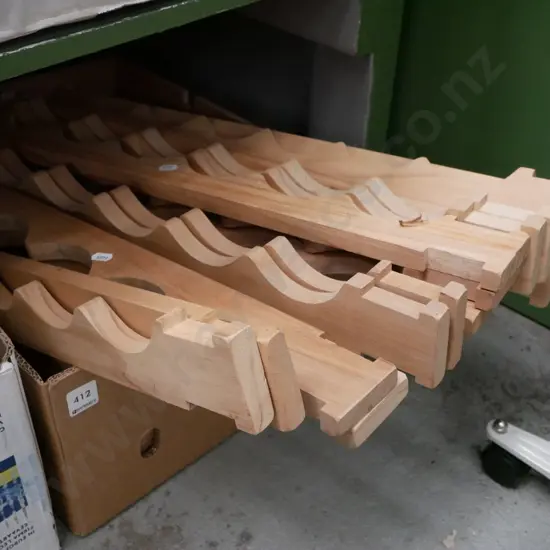 wooden yet to be assembled wine rack