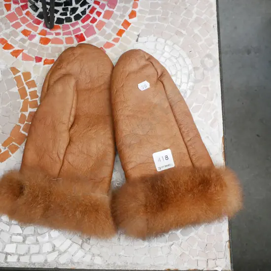 pair of leather mittens