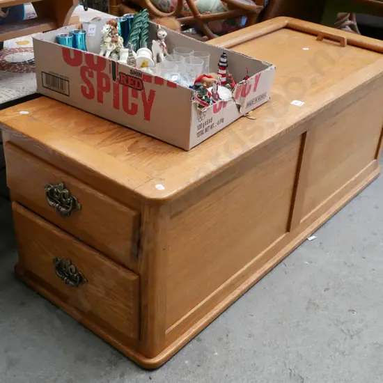 unusual solid wood storage chest with slide top opening and 2 end drawers