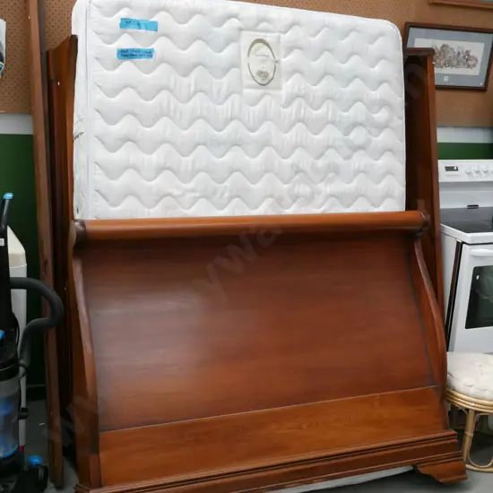 queen Seally Posturepedic sleigh bed and mattress with 4 drawers in base (slight colour damage)