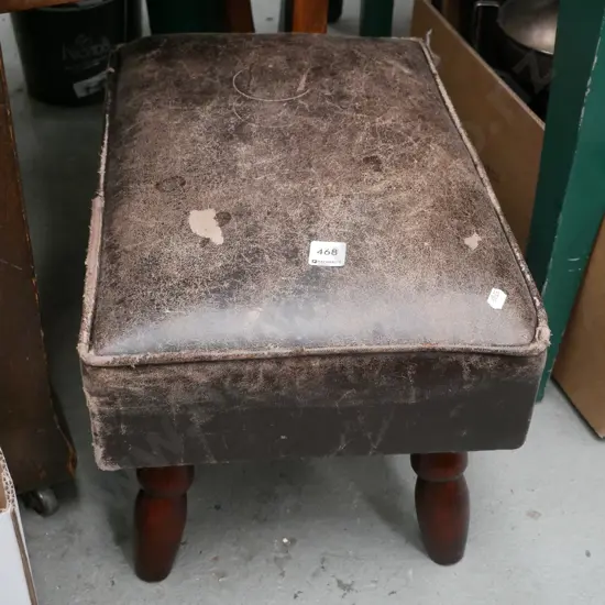 worn leather top stool