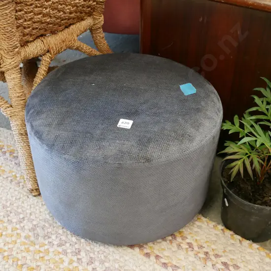 small blue upholstered ottoman