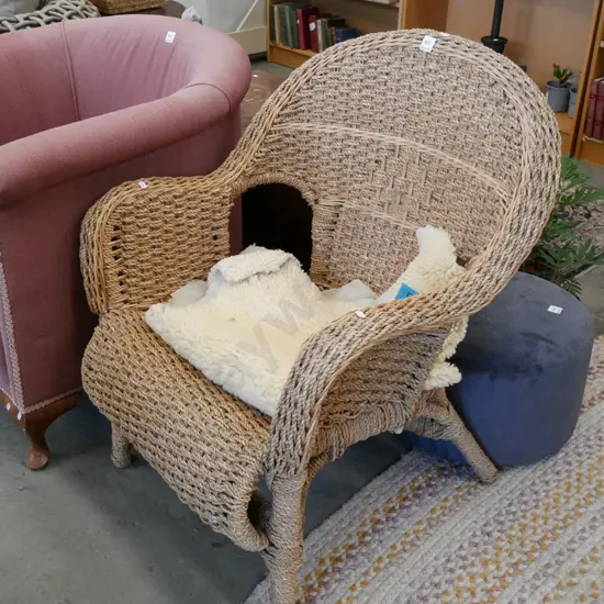 woven cane armchair